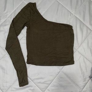 It’s an Army green one sleeve top from garage, wore about twice.